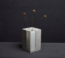 Load image into Gallery viewer, Bright stabel vase from Prasklo made from up-cycled glass material, a white chandelier, and cement, concrete. Individual single art piece
